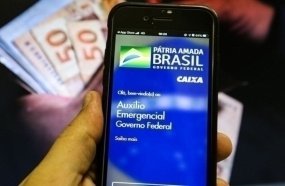 Caixa paga sétima parcela do auxílio para nascidos em junho